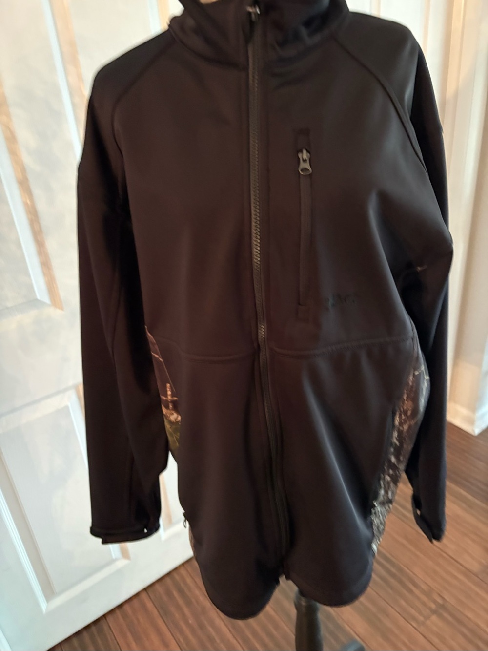TAG OUTDOOR CLOTHING- long sleeve Black with tree foliage/camo on side